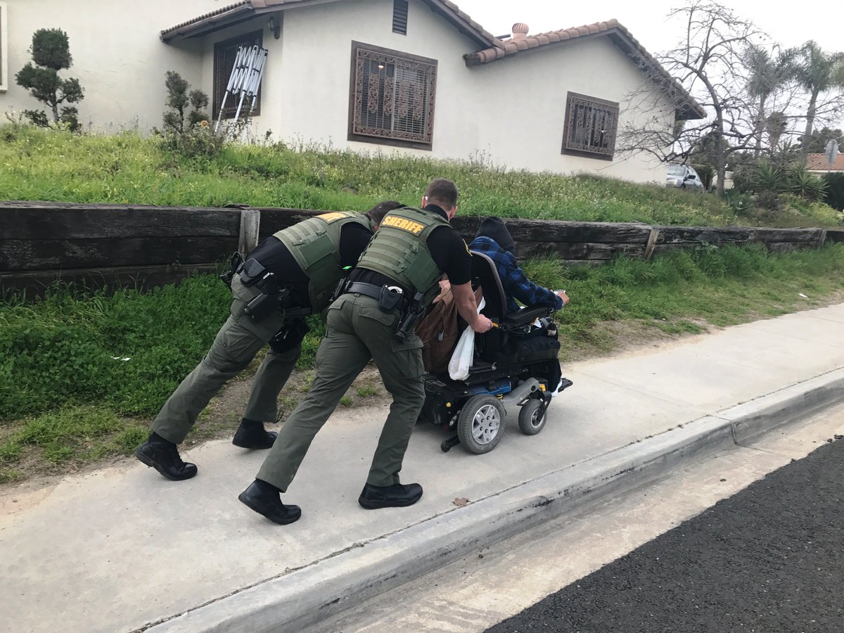 @SDSO Sergeant Scroggins and Corporal Cottrell pushing a disabled man in a broken electric wheelchair two blocks to his home on February 12th in @cityofvista.  You too can make a difference in your community.  Apply now at joinsdsheriff.net.