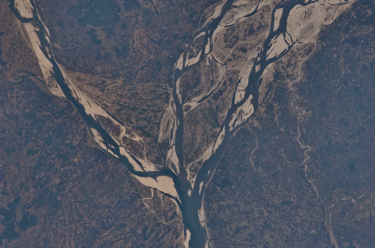 The Ganges and Jamuna river confluence in <a href="/Bangladesh/">Bangladesh</a>, along with surrounding agricultural areas. Taken by a crewmember aboard the International Space Station during Expedition 22.