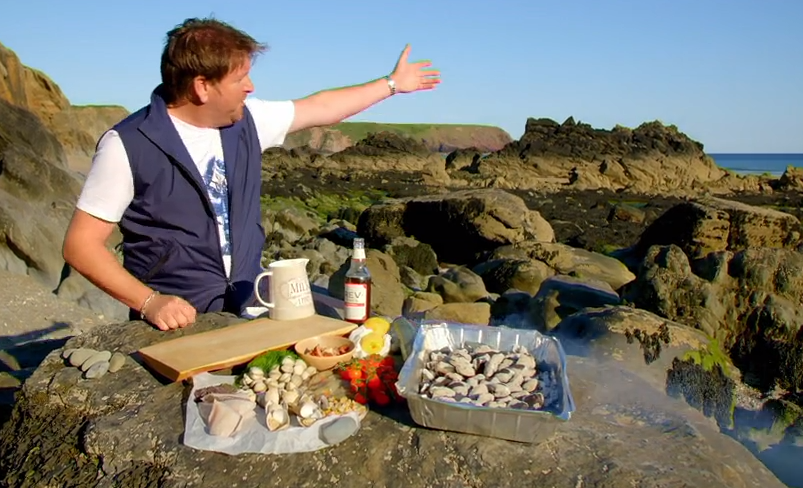 brainsbrewery's tweet photo. Great to see @jamesmartinchef enjoying a Rev. James Original, whilst cooking on the wonderful Pembrokeshire coast on his #greatbritishadventure! It is the perfect accompaniment whilst cooking🍺 https://t.co/QlC6cmULPR