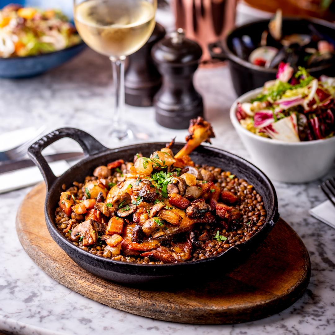 Palmcourtwc2's tweet photo. The perfect dish for a cold day - Confit Leg of Duck with puy lentils, bacon lardons, baby onions &amp; button mushrooms! https://t.co/Kgs9od9FuN