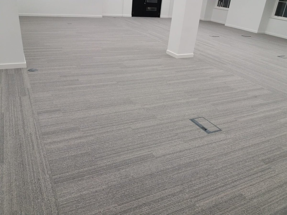 Near & Far planks from @Interface_UK laid to the clients design in some Glasgow offices yesterday #floors #design #carpet