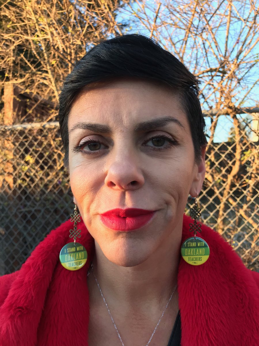 lilyjamali's tweet image. Teacher/Par Coach Chaz Garcia sporting new earrings on the picket line #ousdstrike ⁦@KQEDnews⁩