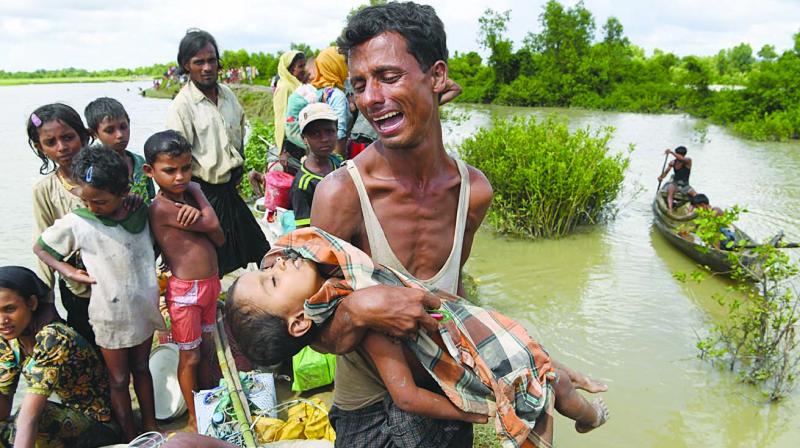 BillFrelick's tweet photo. Beyond belief:  Rakhine State Investment Fair: "To discover untouched opportunities for potential investment in Rakhine State," which can offer investors "richness in beaches, islands &amp; cultural &amp; historical sites." https://t.co/hqi7bLHqBY Promo does NOT feature this photo: https://t.co/QjmxKZnx8i