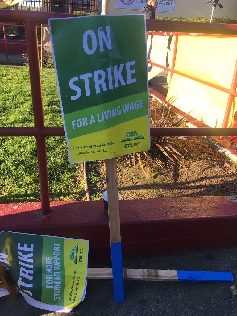 sonipaul's tweet image. Scenes from the Oakland Teachers Strike at Manzanita Seed Elementary. Along with teachers, other members of the community are protesting. And volunteers with #BreadforEd have food to distribute. Over 70% of Oakland students qualify for free or reduced school lunch. @TheTakeaway