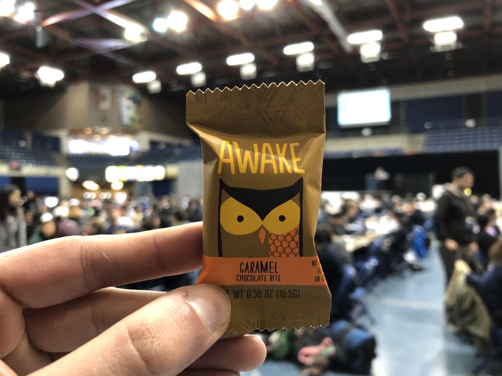 MLHacks's tweet photo. Need a little pick-me-up? Grab some caffeinated chocolate from @AwakeChocolate at @hack_davis! #HackDavis2019 https://t.co/ko3G7rT7la