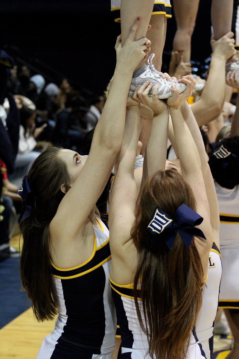 ScheideggPhotos's tweet photo. Drexel University cheerleaders perform a stunt in front of the student section #drexeluniversity https://t.co/v9hzsm80i7