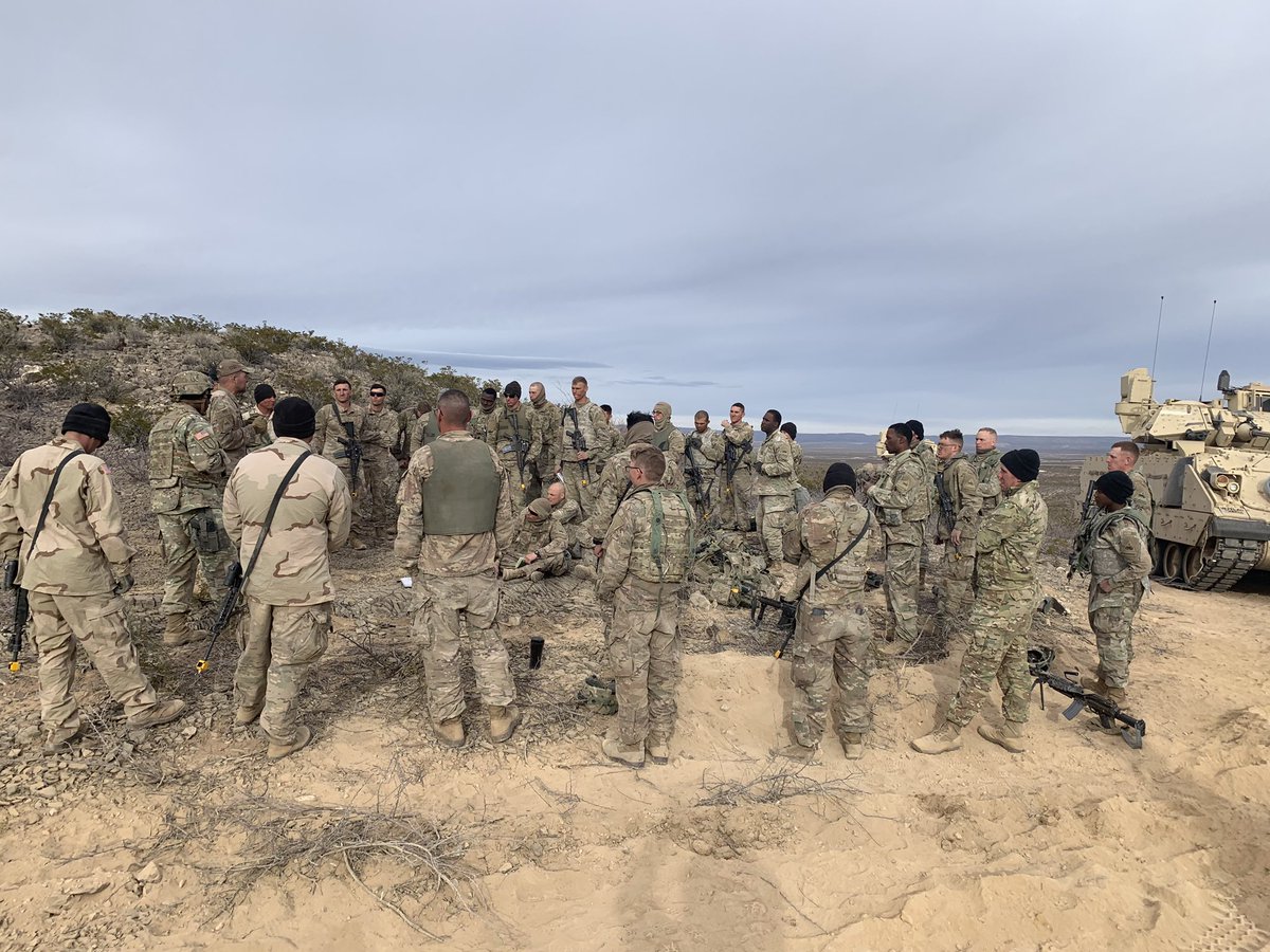 BatteringRams40's tweet photo. CPT Baughman, White Fox 6, and CSM Bennett, RAM 7, conduct an AAR after today’s iteration of the Attack lane. AAR’s are critical to development as they help to highlight sustains and improves from the training observed. https://t.co/G76S96KMoe