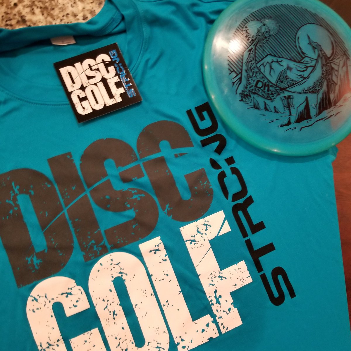 daves_beets's tweet photo. neat package this month from @discstore #discmember lounge the mako and can't wait to try the @discgolfstrong workouts! https://t.co/fDkbV7MtLU