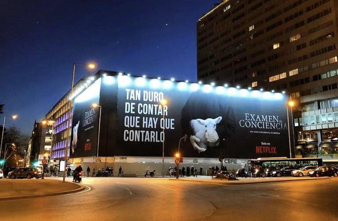 enricsanchez's tweet photo. Todos los manifestantes que vayan hoy a la Plaza de Colón tendrán que ver este cartel que ha puesto Netflix sobre el documental de la pederastia en la iglesia. ¡Disfruten! https://t.co/LuinMwYXOc