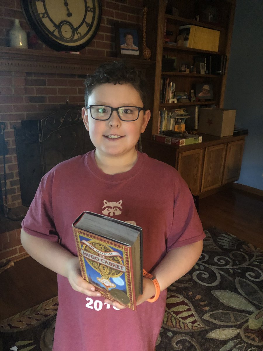 dawnbadia1's tweet image. He finished his Ginormous book!  #towerofbooks #WEareLakota #UnionElementary