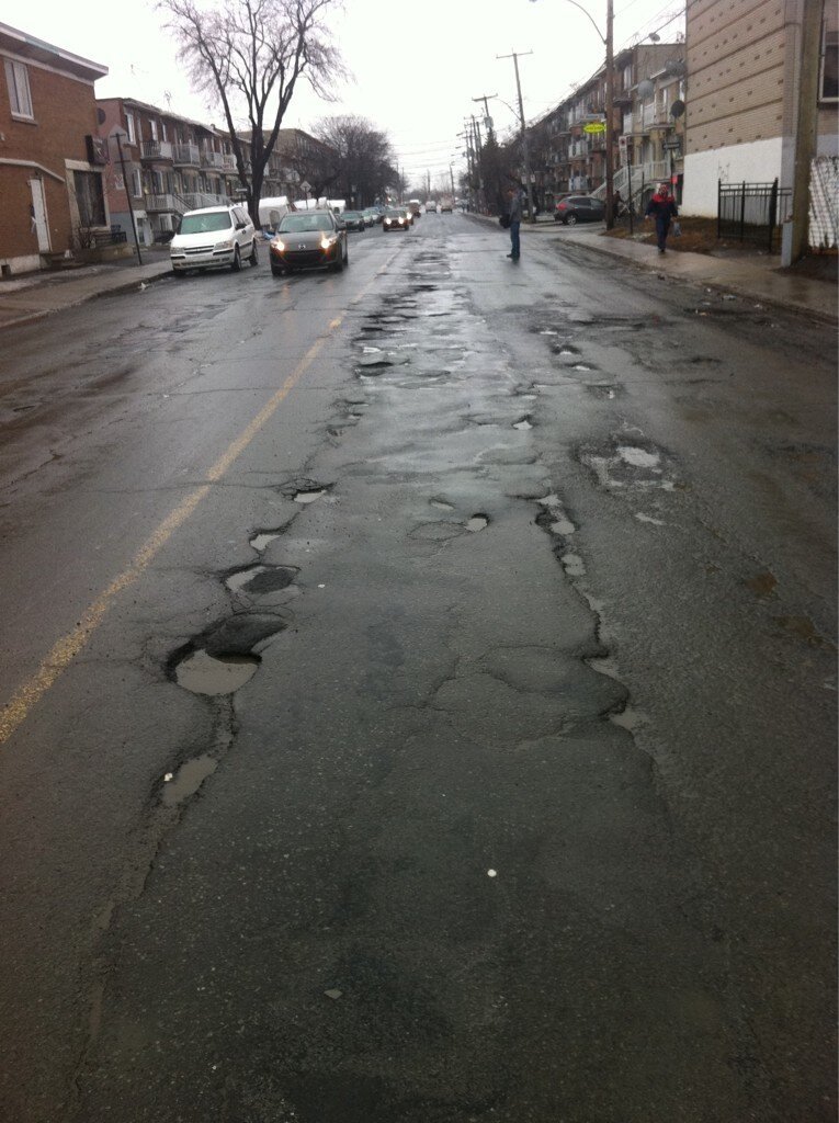CoalitionParcEX's tweet photo. Montreal: City of POTHOLES

3-4cm solid ice on roads! 
Stop blaming mother nature, take responsibilities..... https://t.co/3dTzZLBWKg