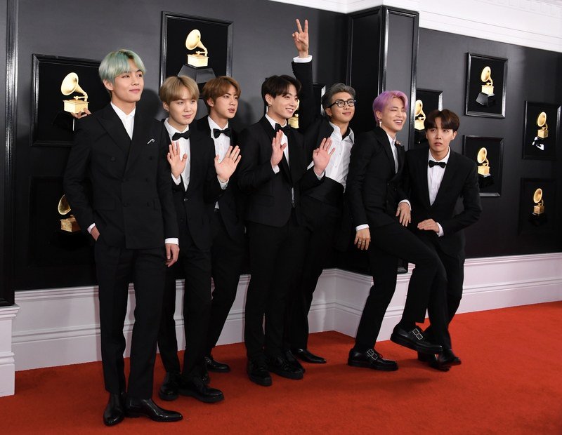 VogueRunway's tweet photo. .@bts_twt makes their #Grammys red carpet arrival. https://t.co/WwFF5UCWpE https://t.co/9Vat6ME9lM