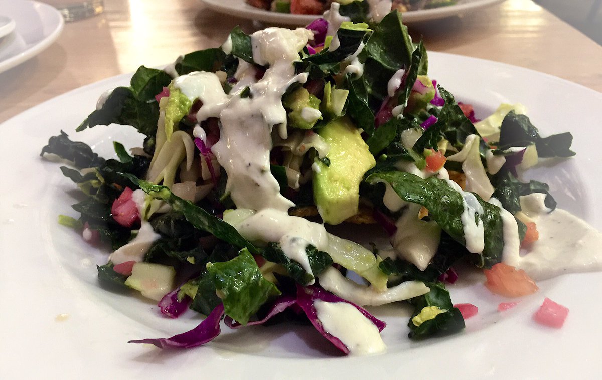 SomethingBtr's tweet photo. The Avocado Hummus Tostada from Pita Jungle in Phoenix. The “Jungle Damage Green Sriracha Sauce” just takes this dish to another level. It’s like a karate kick to your taste buds! https://t.co/cRIDNSHNYL