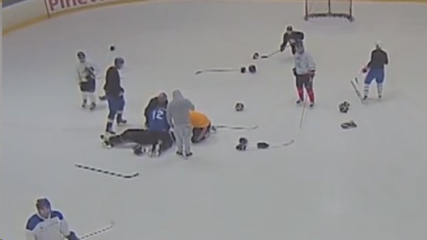 BarDown's tweet photo. Doctor saves life of fellow rec league player by performing CPR on ice. WATCH @ https://t.co/f4Y6k4ba4n https://t.co/fbc0BoNiPe