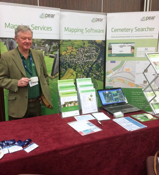 PearTechnology's tweet photo. The stand is up and Chris has his coffee - we're ready for the NALC Spring Conference! Visit our stand to learn more about how your council can use digital mapping #DigitalMapping #CemeteryMapping #SpringConf19 https://t.co/ChRPEv8zXI
