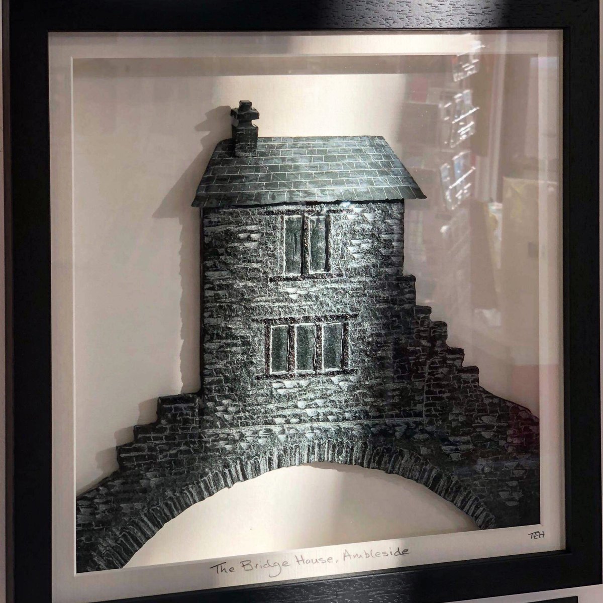 The Bridge House Ambleside by Terry Hawkins @LovingSlate, looking amazing on the wall at #CherrydidiAmbleside in the gorgeous sunshine, such a beautiful piece of work and a splendid day! #greenslate #CumbrianSlate #TheBridgeHouseAmbleside #WinterSun