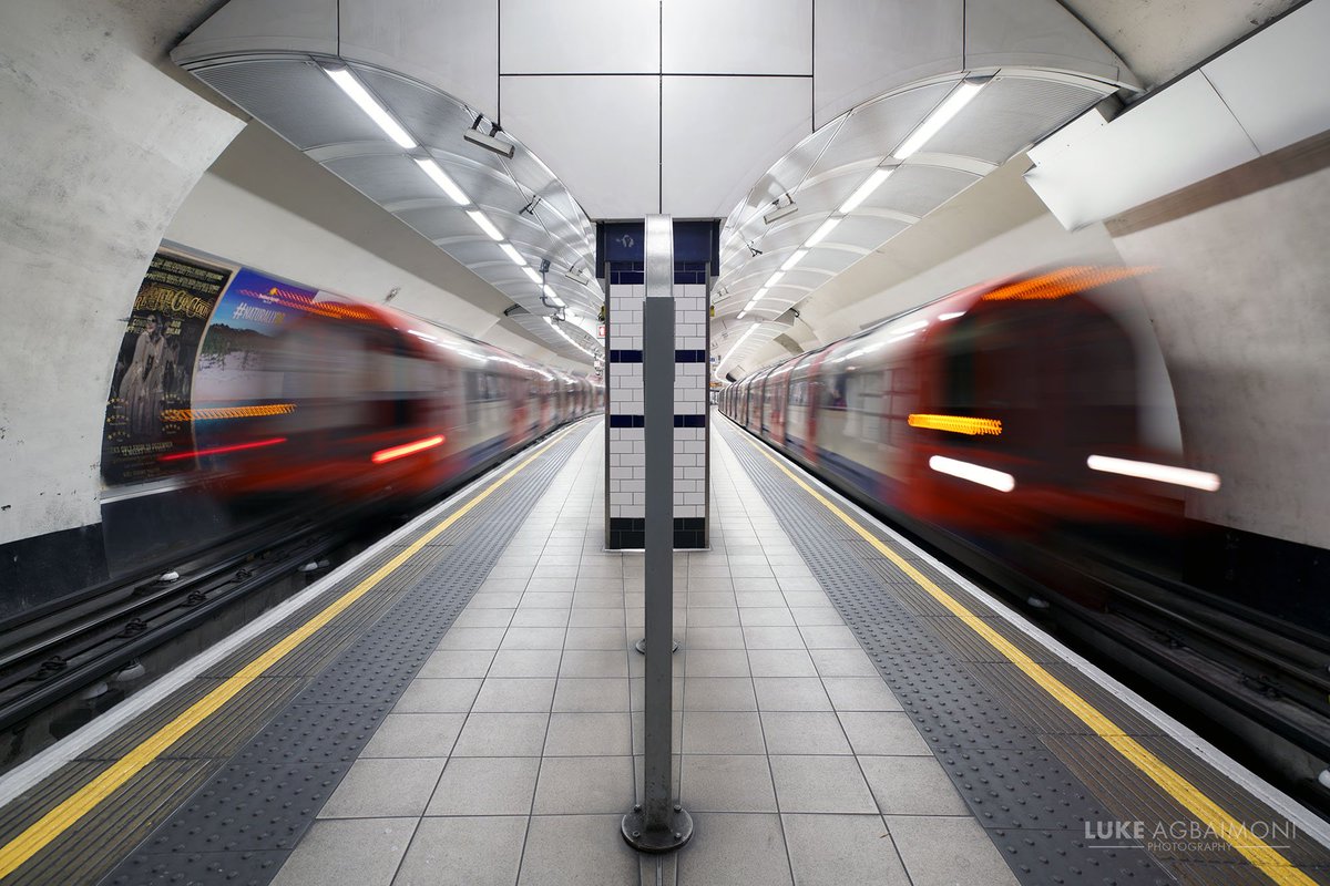 LONDON UNDERGROUND SYMMETRY PHOTO / 15SHEPHERD'S BUSH STATIONA double whoosh,At Shepherd's Bush More photos https://shop.tubemapper.com/Symmetry-on-the-Underground/Photography thread of my symmetrical encounters on the London UndergroundTHREAD