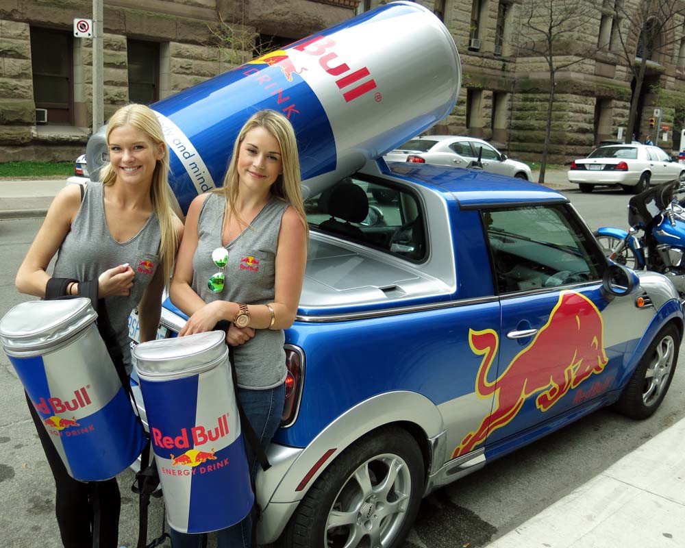 Red Bull is known to hire attractive young women to drive around to sporting events, public spaces, etc and give away free cans. It takes a certain confidence and conviction to do this. But they know it works. If you're thirsty and an attractive woman gives you a drink, wyd?