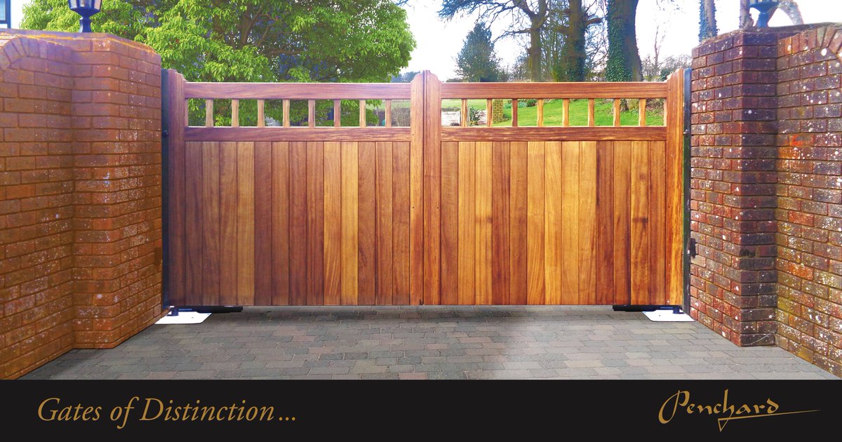 A traditonal style #Iroko #gate fitted between existing brick piers.  A very neat install using an underground automation #FAAC system. #gate #automatedgate pencharduk.com