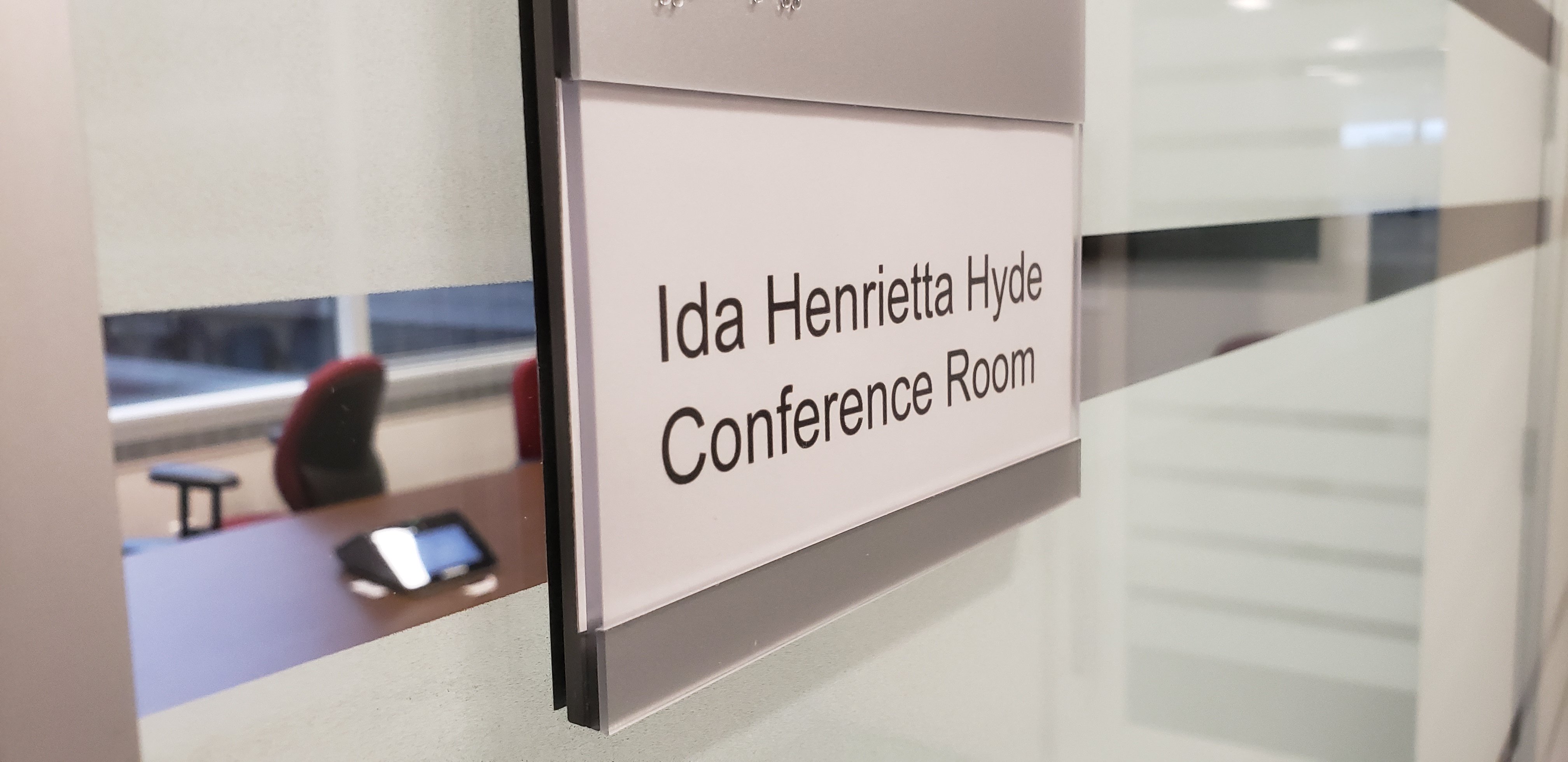 a label outside a conference room reading "Ida Henrietta Hyde Conference Room"