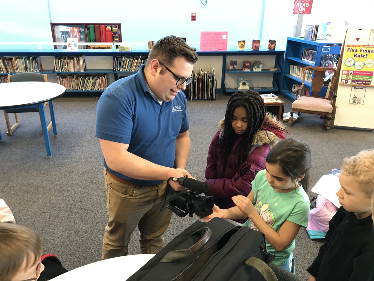 kmayoTechTeach's tweet photo. Fun day shooting interviews (@library_ph and @PH_Wellness) with my 3rd grade PH Panthers News Team! Big thanks to Scott Kurland from @ApacAyer who helped out and taught the kids about how to break down the camera equipment. #asrsd #phpanthersnews #edtech https://t.co/wUzbvtKWDM