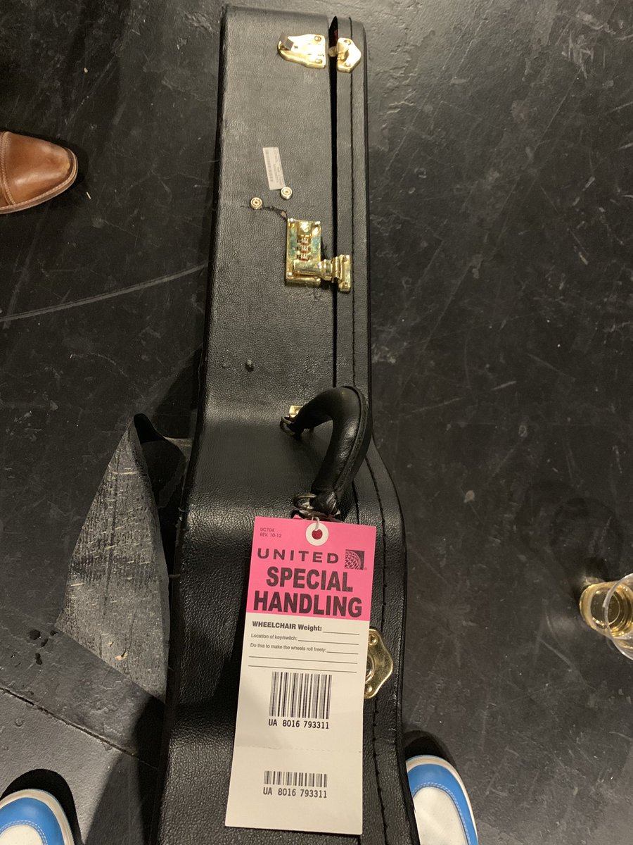 They gave me the handle with care tag when I gate checked my acoustic but some how the case holding my $10k guitar still looks likes this. @united