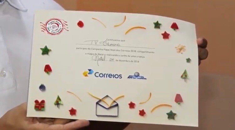 tvcamaranatal's tweet photo. A @tvcamaranatal recebe certificado do superintendente dos Correios, Rodrigo Medeiros, por apoiar e divulgar a campanha "Papai Noel dos Correios". Confira: https://t.co/UmI5KfI6Vy https://t.co/7BmlN8B3jY
