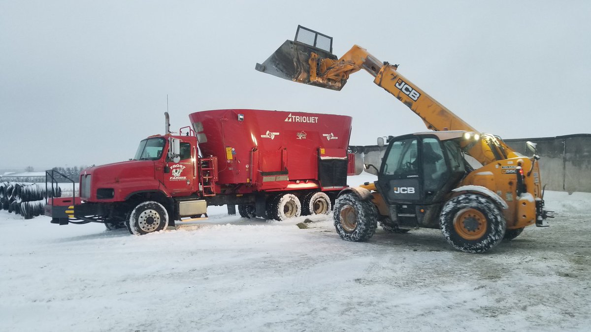 paulfrostfarms's tweet photo. 1st load of feed in our new @TriolietENG #TMRmixer  Cliff's Inc in WI worked with us to set it up our existing truck.  @JCBAgriculture #550agri loading it up in the snow! #loadfeed #pushsnow #WIdairy https://t.co/weqgnTvsEQ