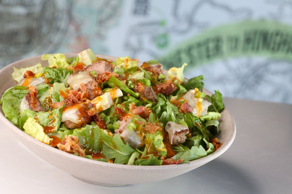 Wahlburgers's tweet photo. Donnie's favorite over mixed greens!? Yes please! 😋  #BBQBaconWahlbowl https://t.co/6UIzYp8DGz