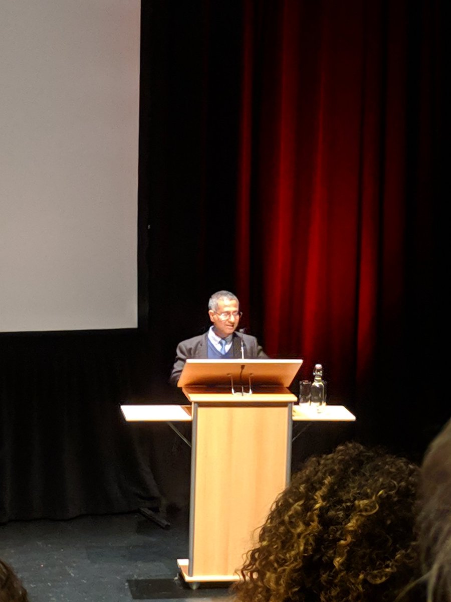 twoxey's tweet photo. Dr. Ahmed Hasheed of the Human Rights Centre of the University of Essex is opening the premiere of 'The Long Haul' - a tribute to Nigel Rodley https://t.co/H838KBknfb made by my brother @FokkeVictor https://t.co/pb1Mc4g8gJ
