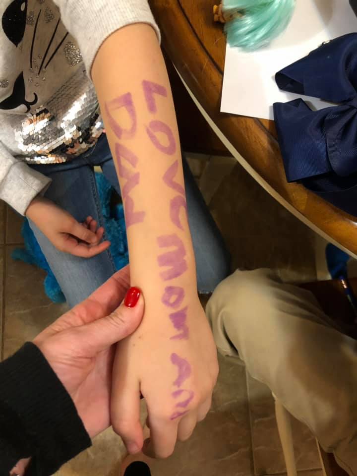 "So my kids school had a genuine lock-down today... I say to her, why did you write that on your arm? She says, 'in case the bad guy got to us and I got killed, you and daddy would know that I love you,' and she started to cry." -Shelley Harrison Reed