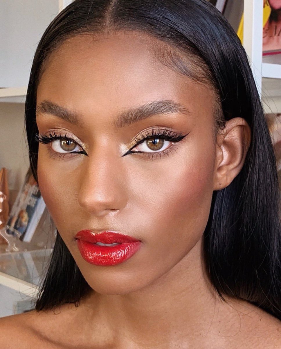 This cat eye and glossy red lip combo has us swooning 