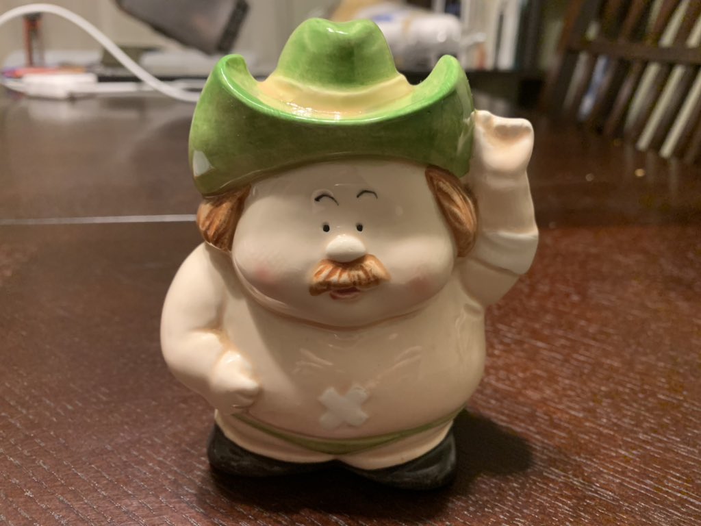 ACraig2031's tweet photo. Day 1: One of my favorite items I randomly stumbled across, a porcelain Stan Hansen piggy bank. #PuroMerch https://t.co/wW8fd1ZhVI