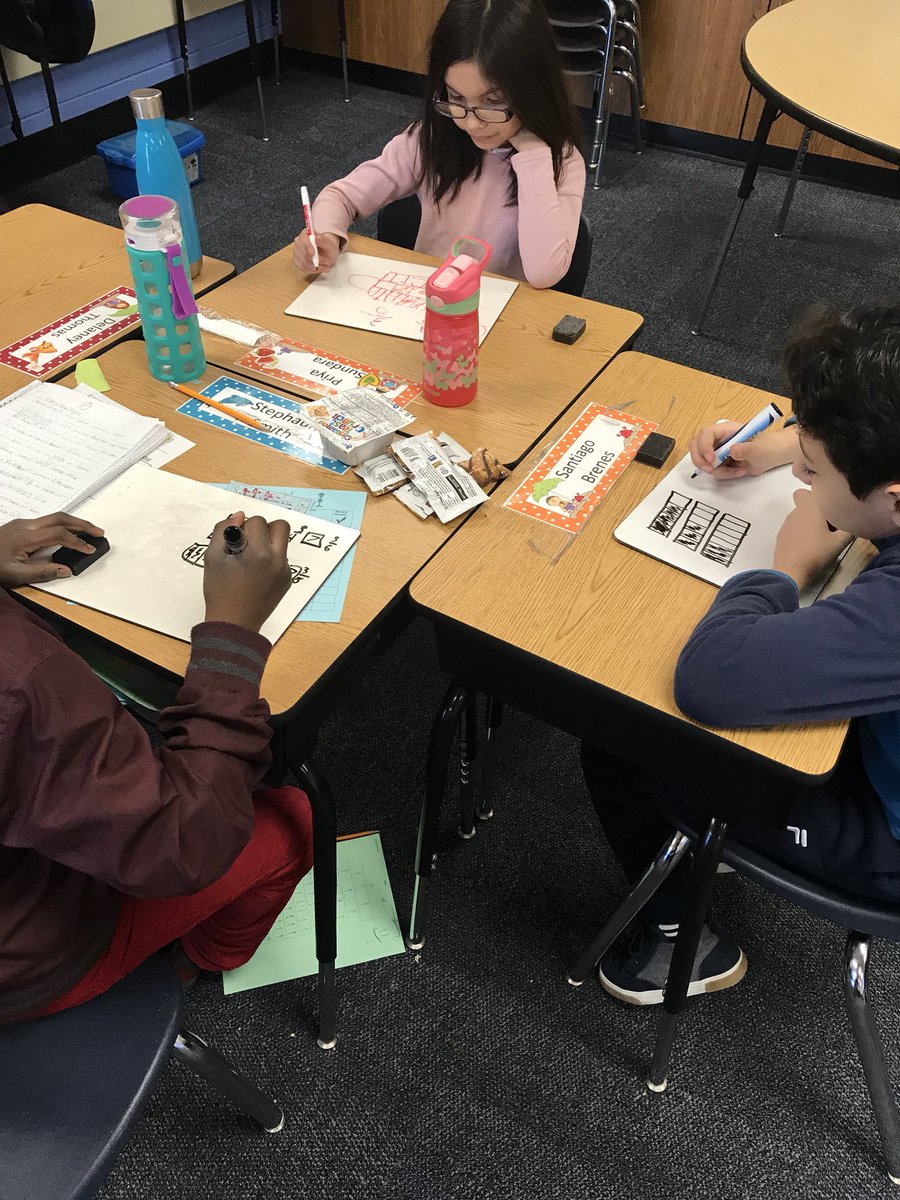 CompsClass54's tweet photo. Comparing fractions in 3rd grade using pictures and fraction tiles!#handsonlearning https://t.co/otqd9jAcBY
