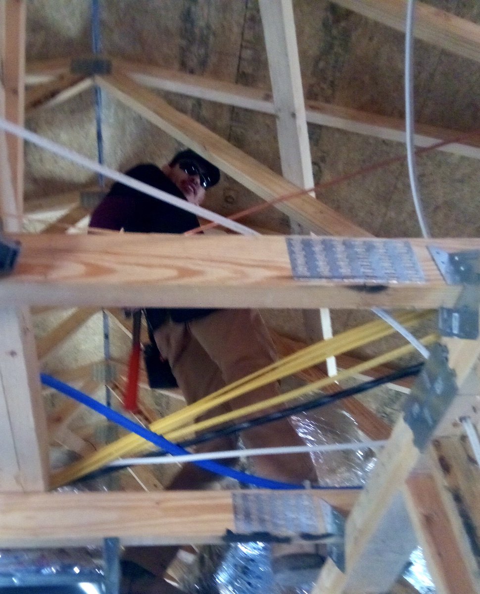 HVAC students in the CATE program contribute to the Habitat for Humanity house during the “roughing in” phase of the construction project.