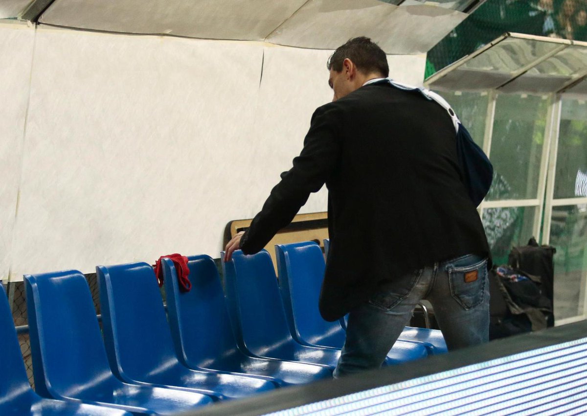 Eurohoopsnet's tweet photo. Panathinaikos owner Dimitris Giannakopoulos leaving a woman’s underwear on the empty Olympiacos bench after the Greek Cup semifinal between the two teams that was never completed https://t.co/jIzKAUfYeS