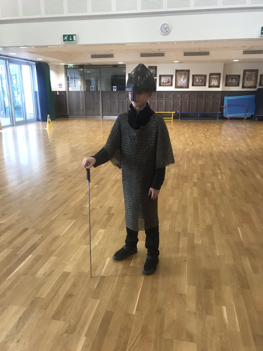 MrsEmilyAllsopp's tweet photo. Lewis modelling Saxon armour: a chainmail vest, a helmet, a sword and a shield; it was a workout just holding them! @MissLoasbyKBA @MrsUnderwood8 @historytalker https://t.co/2xWy9MF5gt