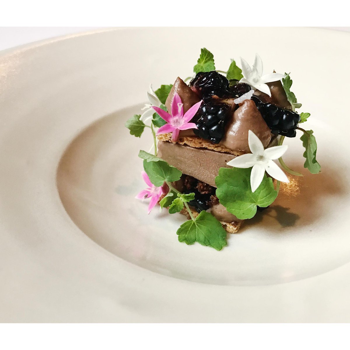 The classy dining room <a href="/OrioleChi/">Oriole</a> (Chicago, Illinois) is made more interesting by the brightly lit kitchen that allows diners to watch the artful assembly of each plate. Congratulations on earning Five Diamonds! #AAADiamonds bit.ly/2tosFnr