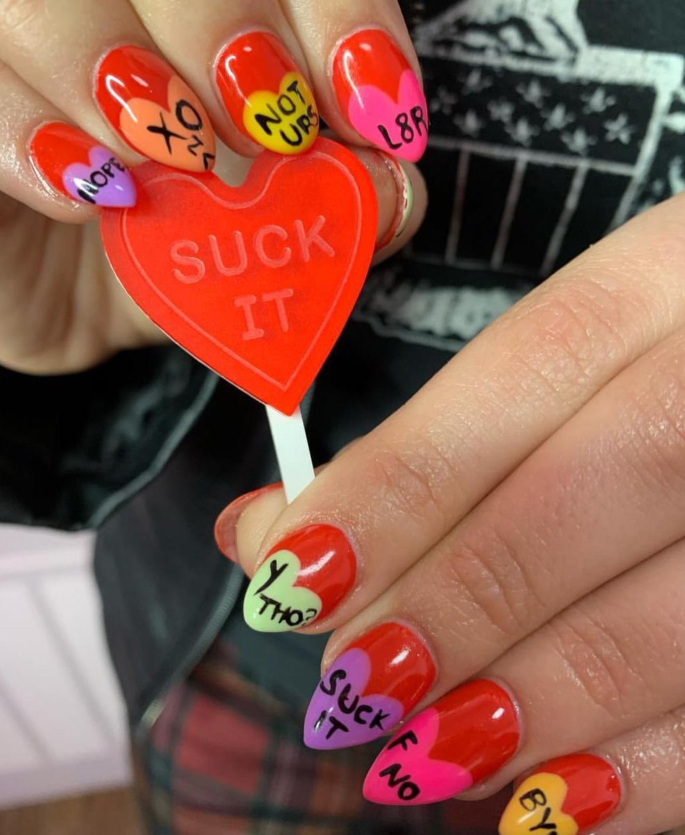 UGH. Are these not the most perfect Valentine's Day nails? Done by our friends @cutenailstudio See <a href="/nicolenailedme/">Nicole Marie</a> for an appt., and TREAT. YO. SELF.

#nailart
#candyhearts
#suckitVday
#valentinesdaycheer
#vincausa
#cutenails