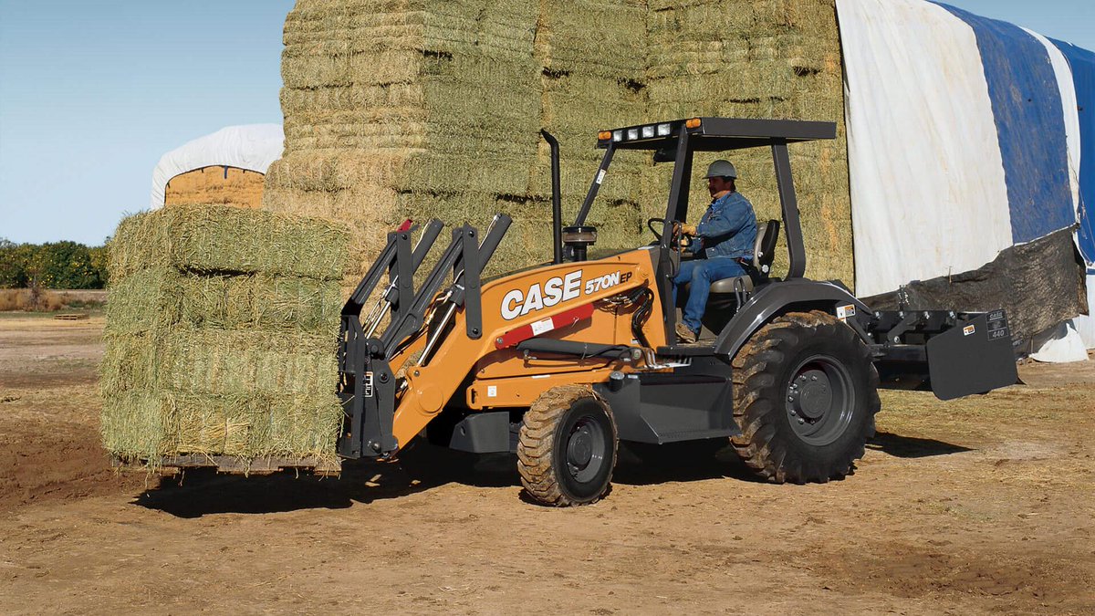 CaseCE's tweet photo. The CASE 570N EP #TractorLoader provides you with over three tons of lifting strength to move, load and stock more piles, pallets and material. https://t.co/j2cXZrJsC7 https://t.co/Swwcq7pJU8