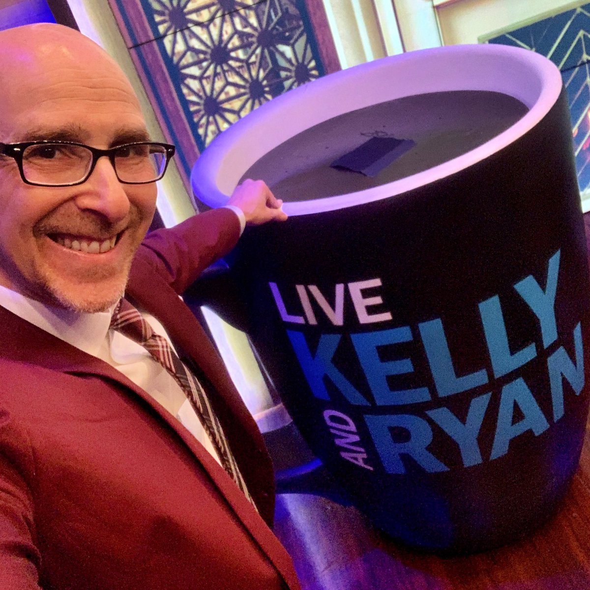 LanceUlanoff's tweet photo. Here’s me with a really big cup of coffee reminding you to tune in to @LiveKellyRyan Friday where I’ll be showing off hot gadgets from @ces. The fun starts at 9AM ET! 
#tv https://t.co/YPgDU02eym