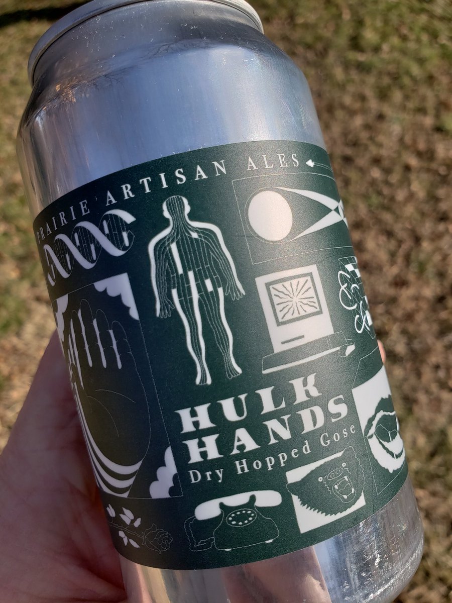 Within our brewery, we have a real laurel/yanny...blue/gold dress debate going with this label. Is it black, or is it forest green? Here it is with no filter, just sunlight: