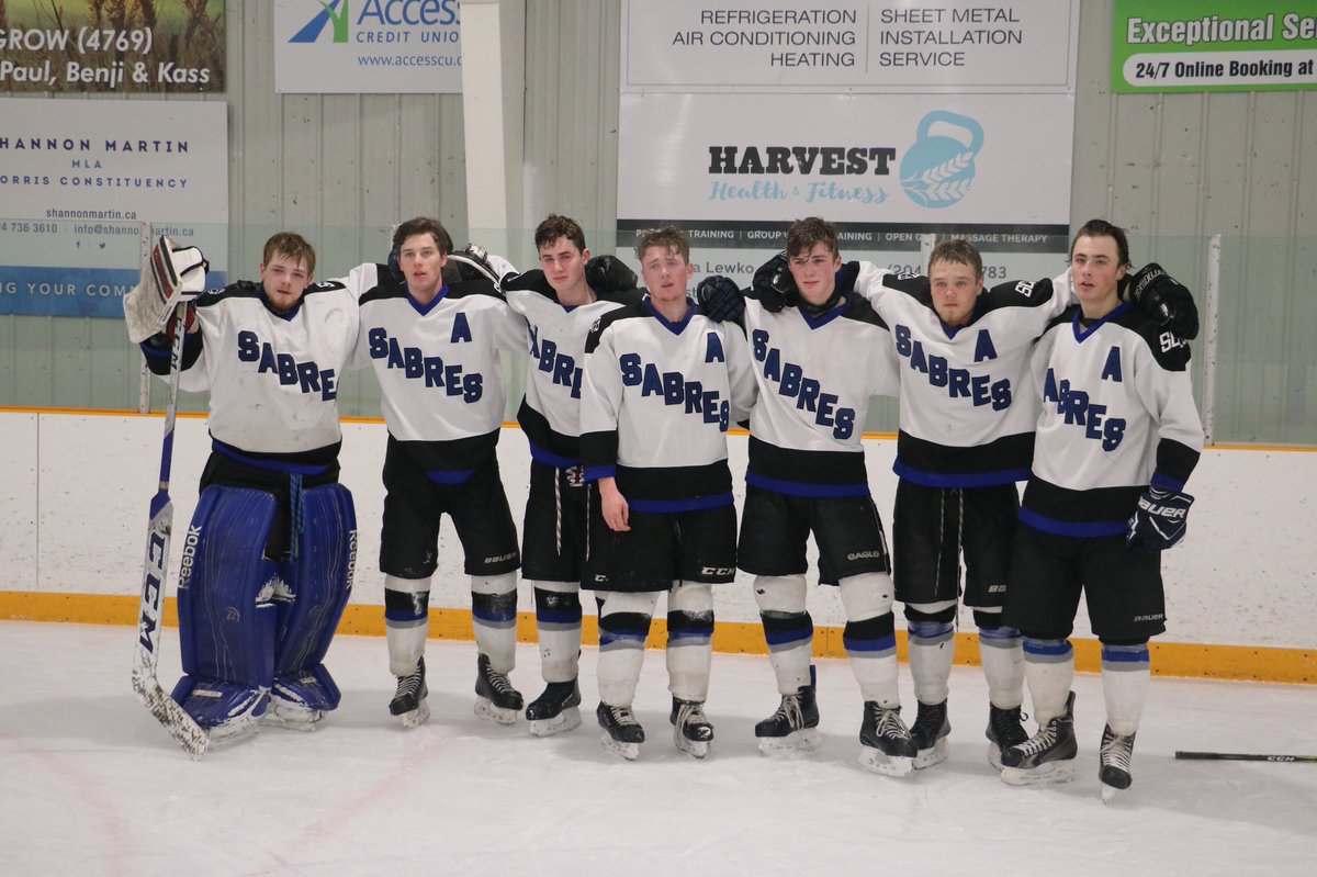SabresBoys's tweet photo. The final Sabres game for these 7 Grade 12 boys. A tough loss for them, wearing the jersey for the last time on the ice. They were great leaders for our team this season! #sabrespride #firstofthelasts https://t.co/L7GyATLnO3
