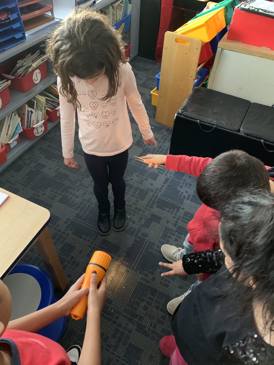 MissTesta22's tweet image. Investigating how light reflects off of a mirror to hit other surfaces in our classroom! #floor #ceiling #100chart