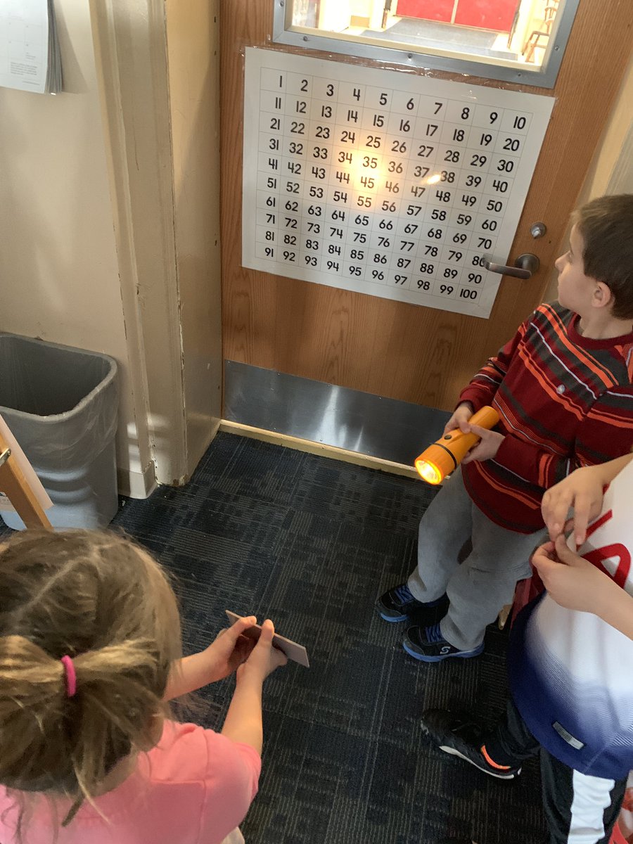 MissTesta22's tweet image. Investigating how light reflects off of a mirror to hit other surfaces in our classroom! #floor #ceiling #100chart
