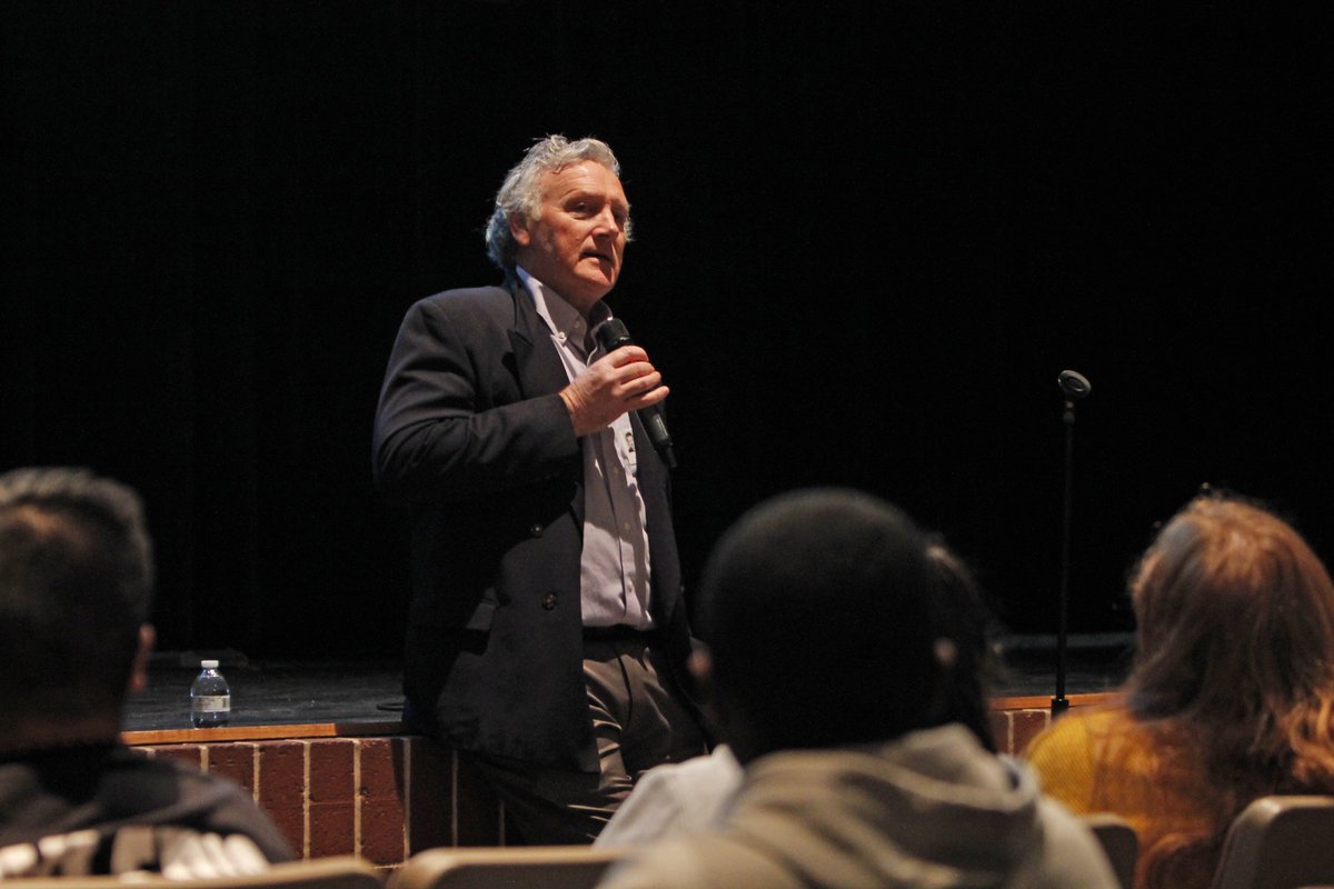 therideronline's tweet photo. Guest speaker, Tim Madigan, speaks to students in AP US History and AP English 3 about the book “The Burning” during second period. This event was sponsored by AVID and held in Legacy’s PAC. (@thisismrskris photo) https://t.co/YIcvI7ZBLX