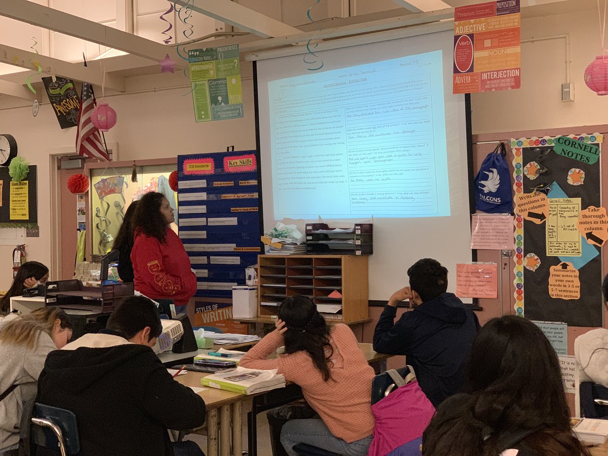 Ripsie80's tweet photo. SFMS students analyzing student samples and presenting their scoring and justifications with the class in preparation to our 3rd Common Assessment.  #SFMS  #ELA #HoM @SFMSprincipal @SFMSTrinidad ❤️ https://t.co/JmQ9Xc52Qs