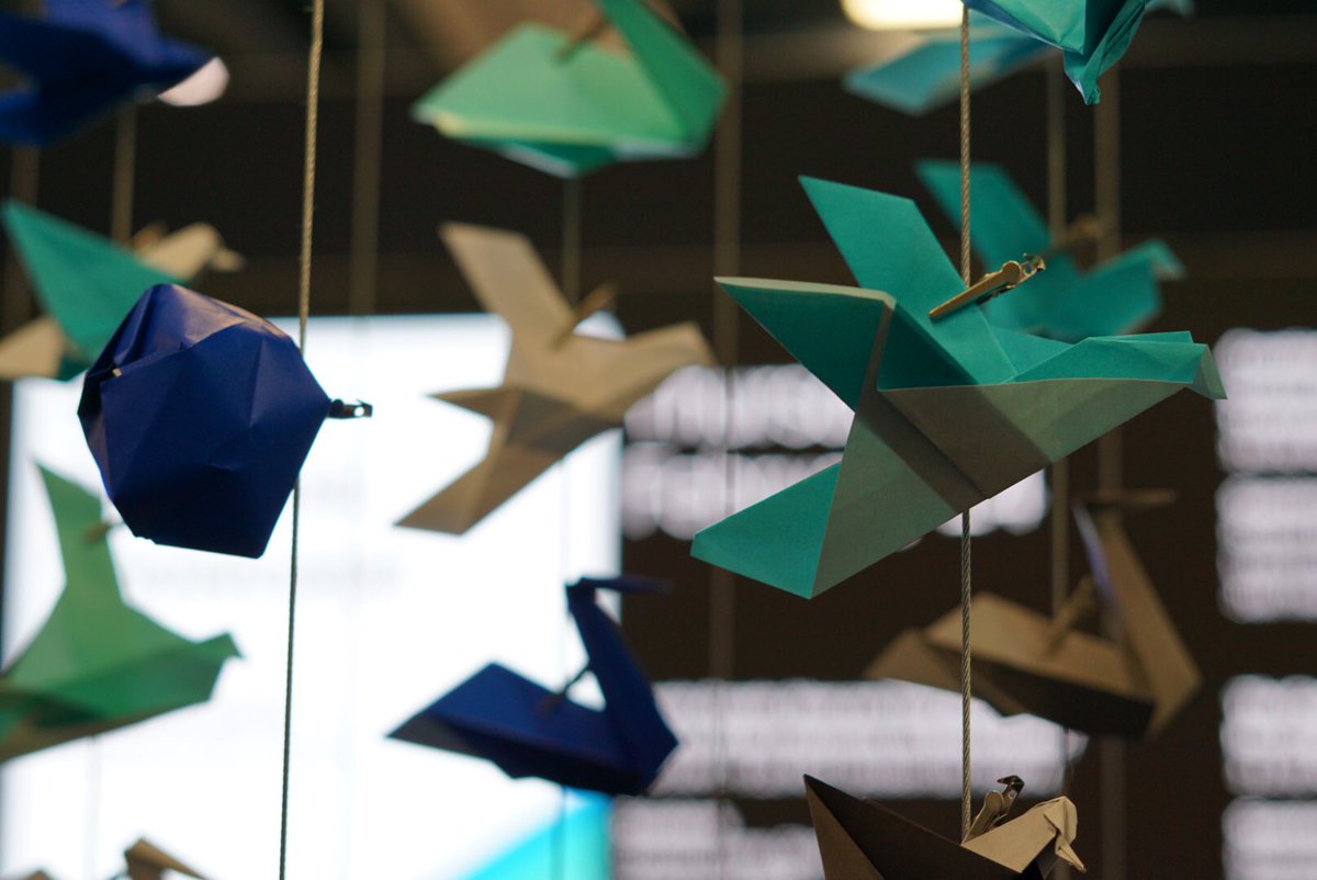 Took a break to make some origami on the show floor #Think2019 #CraftyByNature