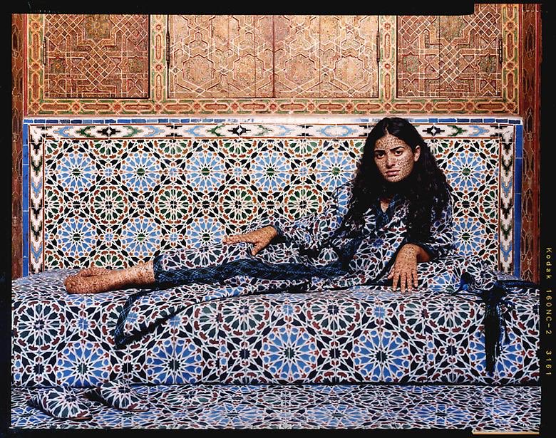 Moroccan photographer, painter, and installation artist Lalla Essaydi from her series ‘Harem.’