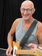 Bruce Knapp has played in many blues, soul, jazz, funk and world music bands since 1985, and recorded many different genres as a session player.  His instruments are guitar, mandolin, dobro and ukulele. He will be one of the staff musicians at hall week 2 in Staple 3-10 August